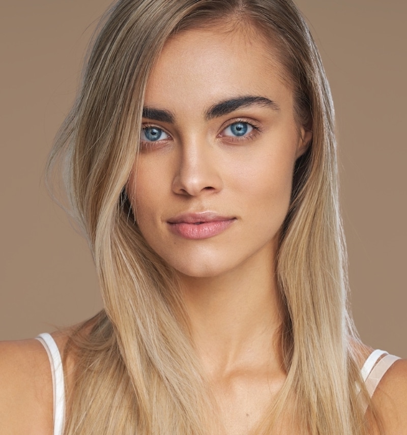 beautiful young woman with bold eyebrows
