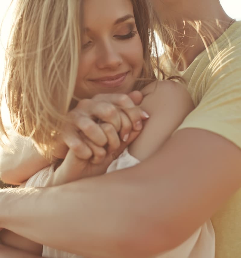 man and woman embracing