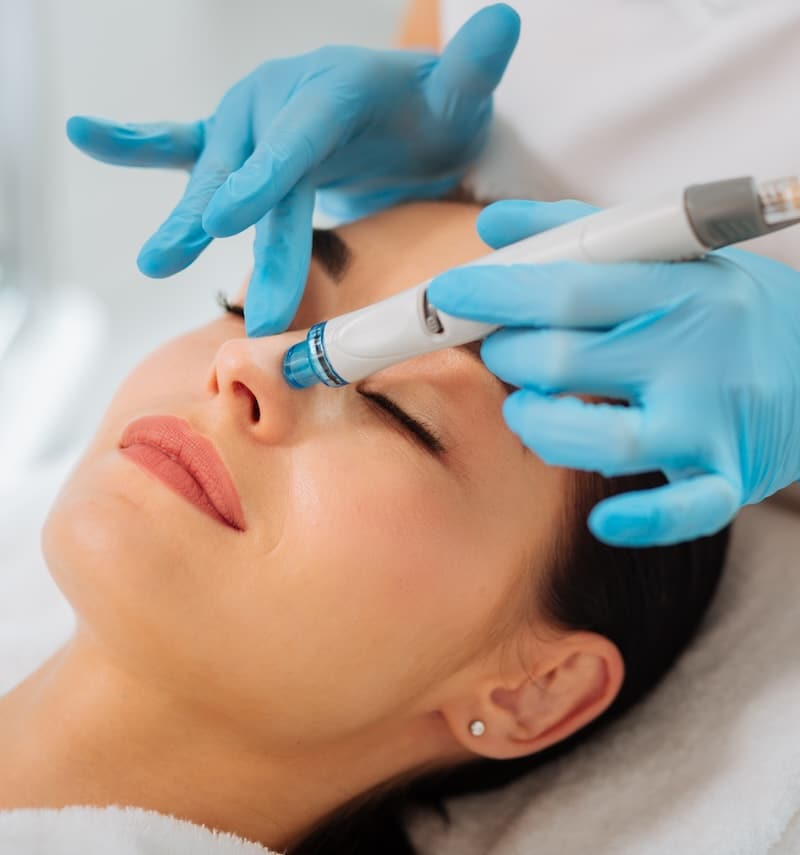woman receiving hydrafacial woman receiving hydrafacial