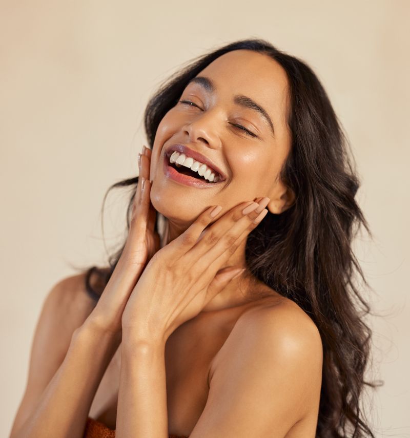 beautiful natural young woman laughing